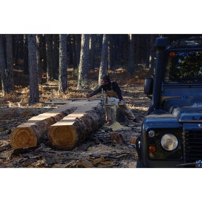 A man finishing the 2 logs using a Granberg's Tool